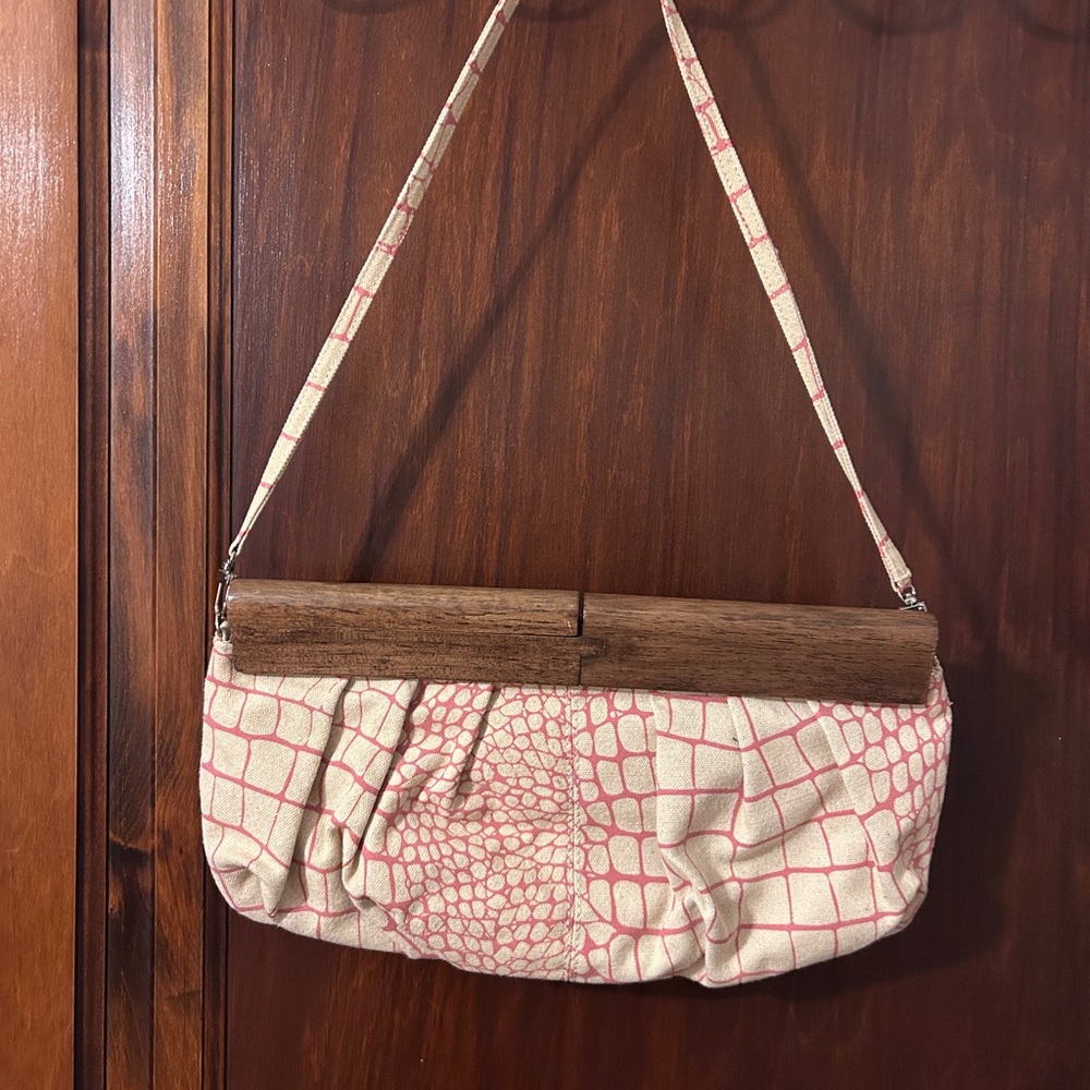 Sondra Robert’s Elegant Pink and Cream Clutch Bag